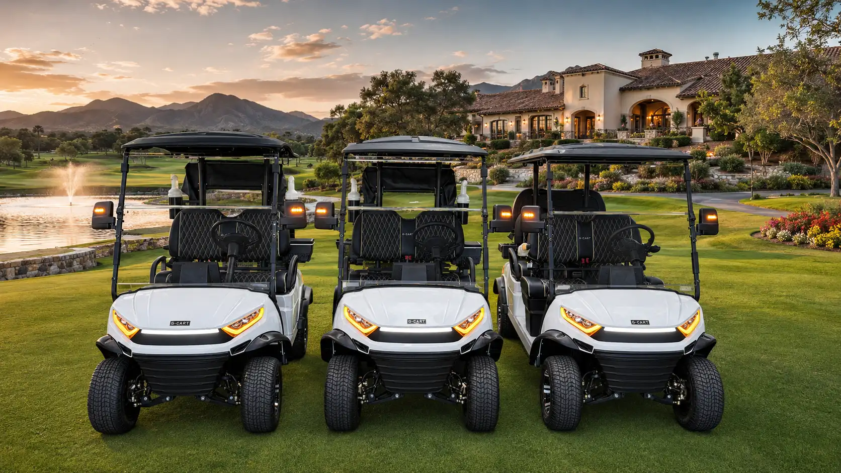 Three white G-CART electric carts lined up on a golf course lawn at sunset